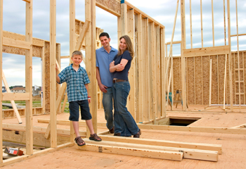 realtor and clients on building lot